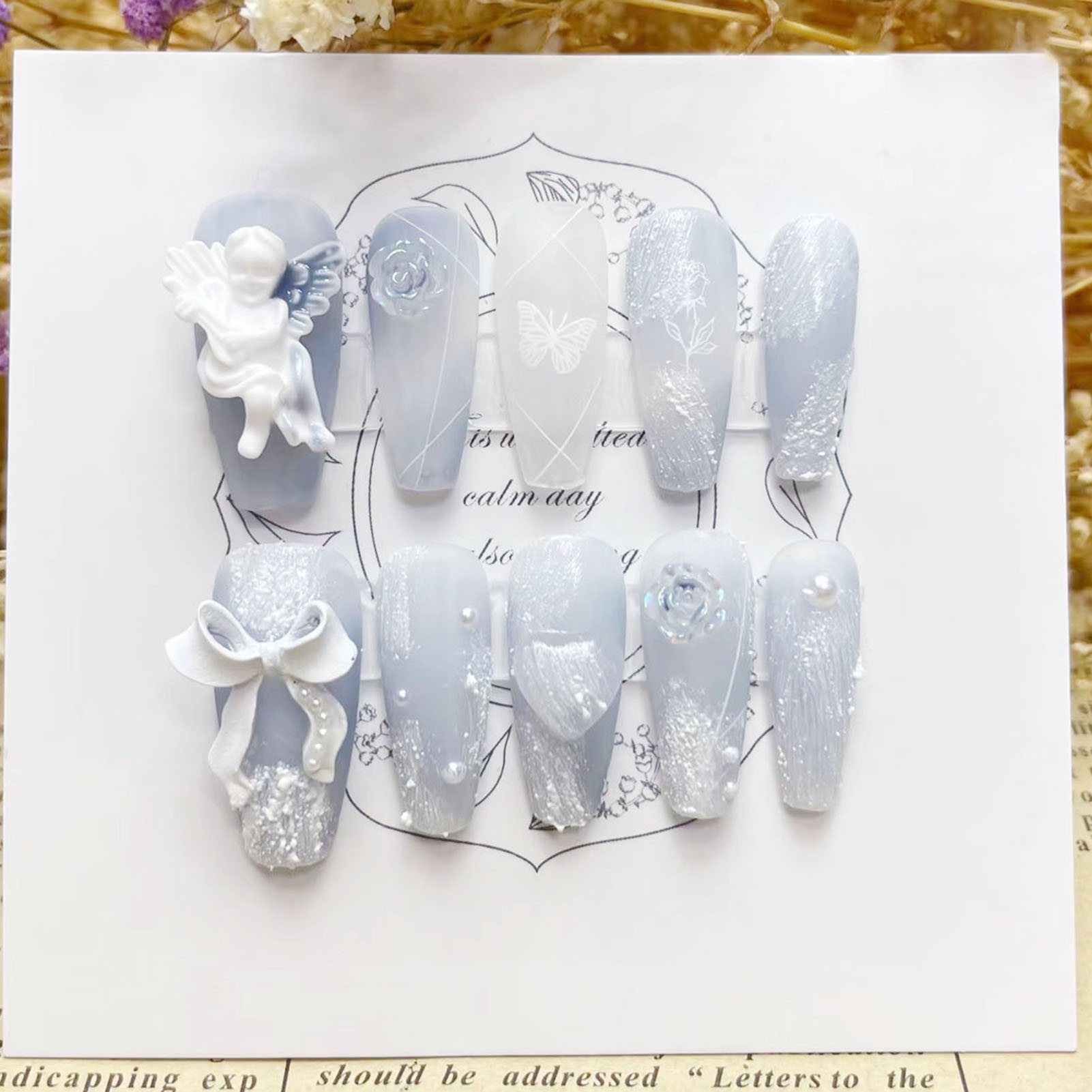 3D gesso angelo unghie finte l - Nail Art Press On recensione e prezzo
